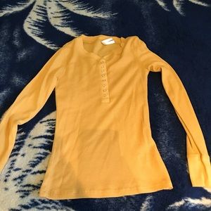 Yellow button down shirt